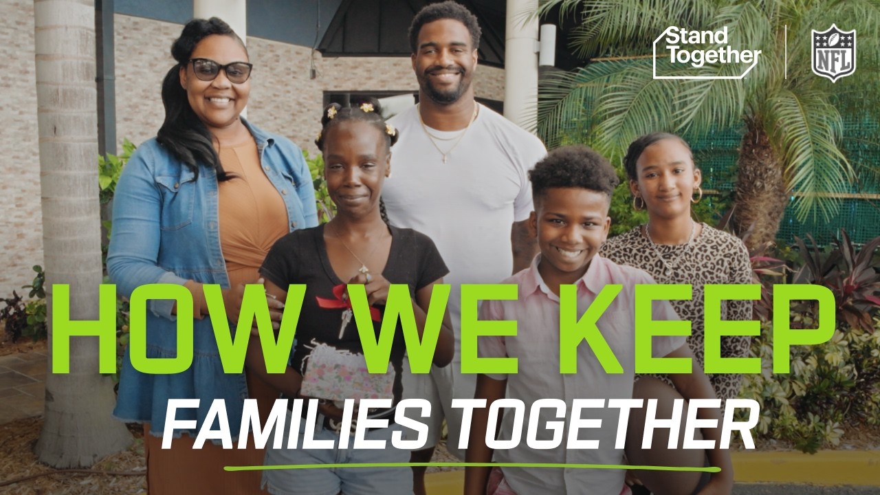 Jonathan Allen with a family featured in a My Cause My Cleats campaign film
